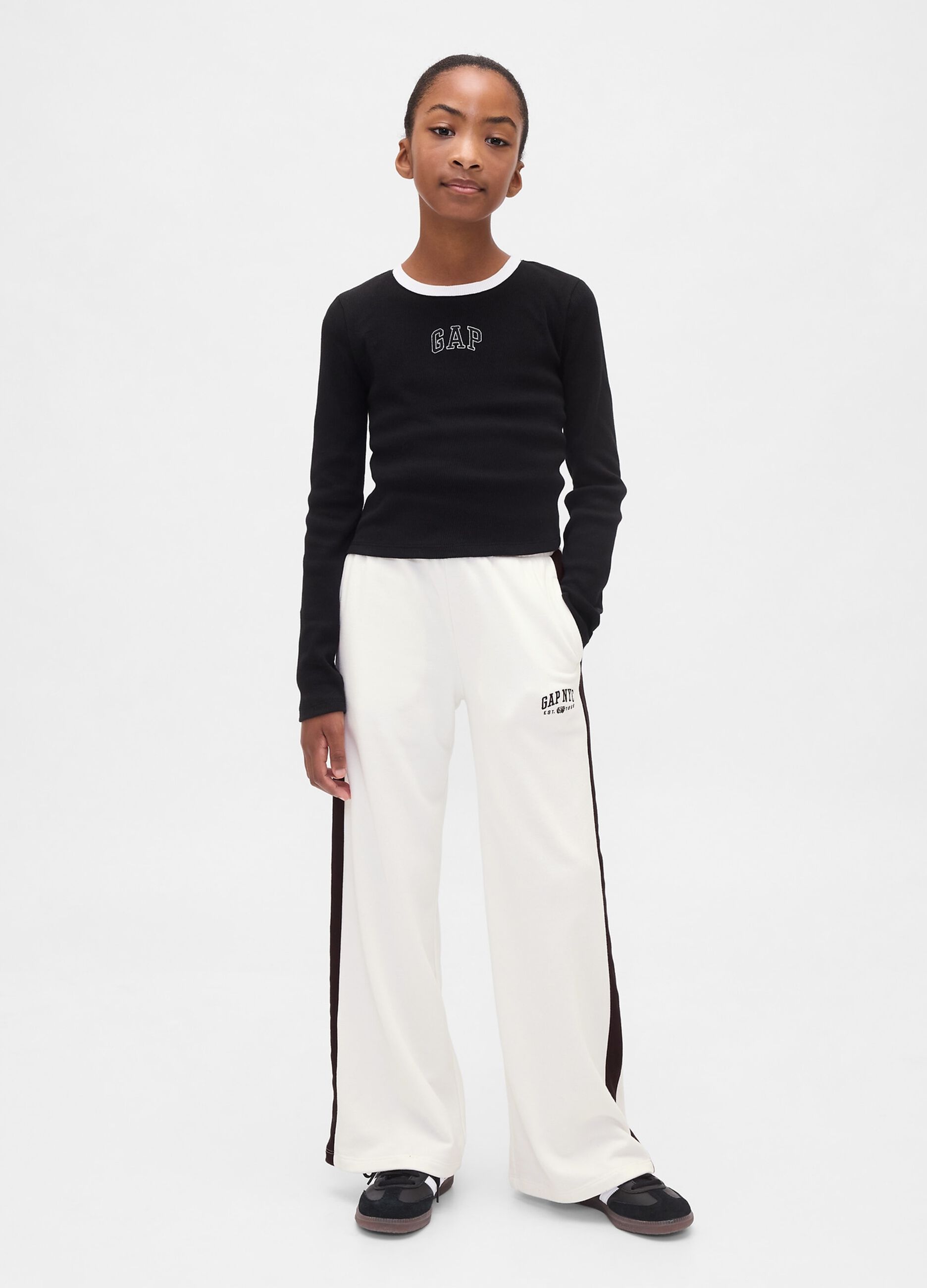 Pantaloni bianchi per bambina in cotone