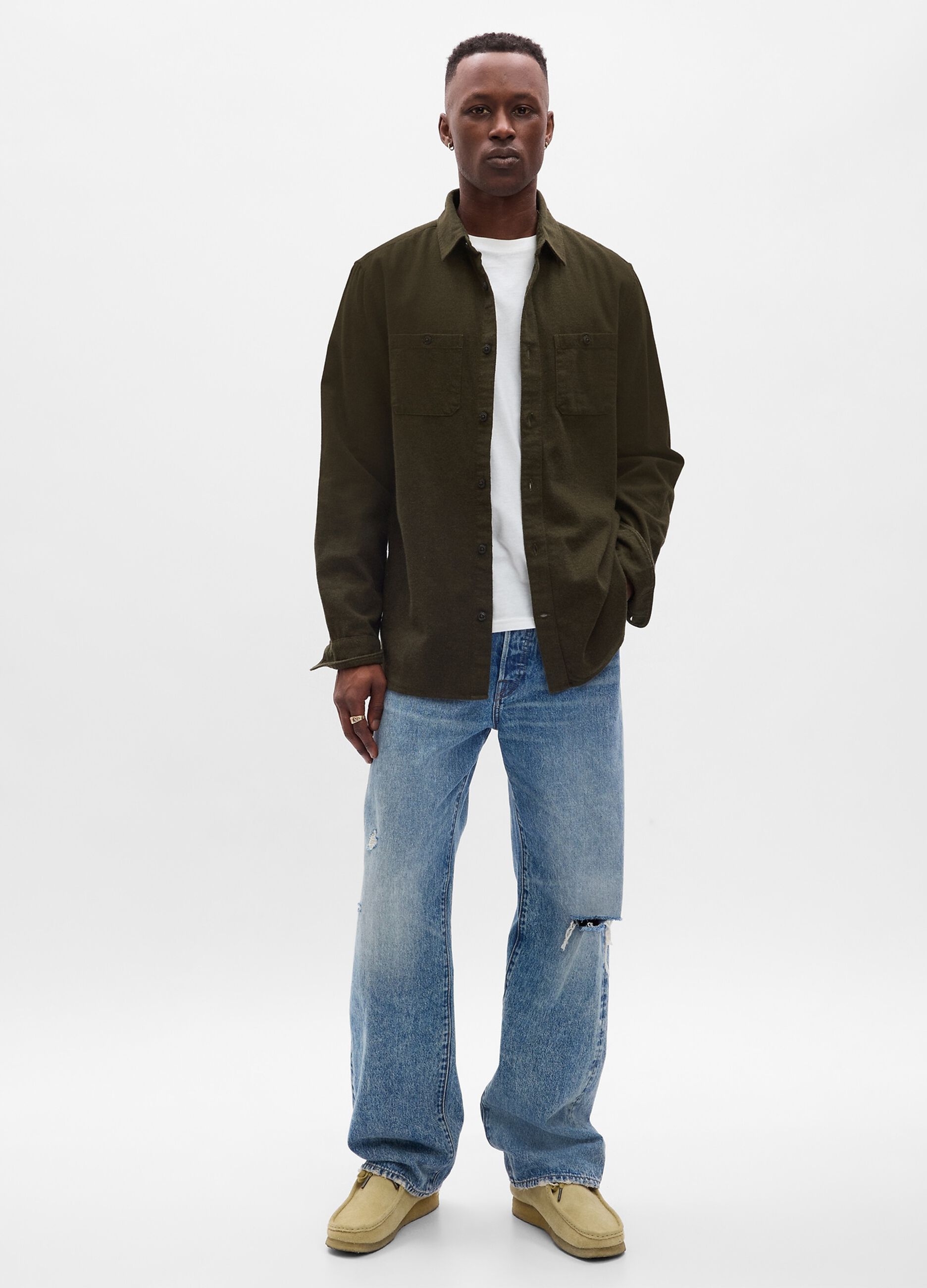 Jeans loose fit acid wash con strappo