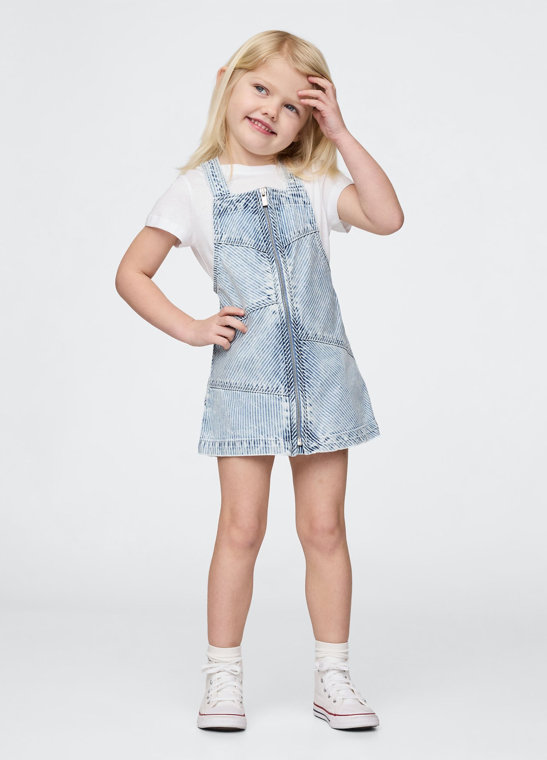 Salopette in denim chiaro con zip frontale