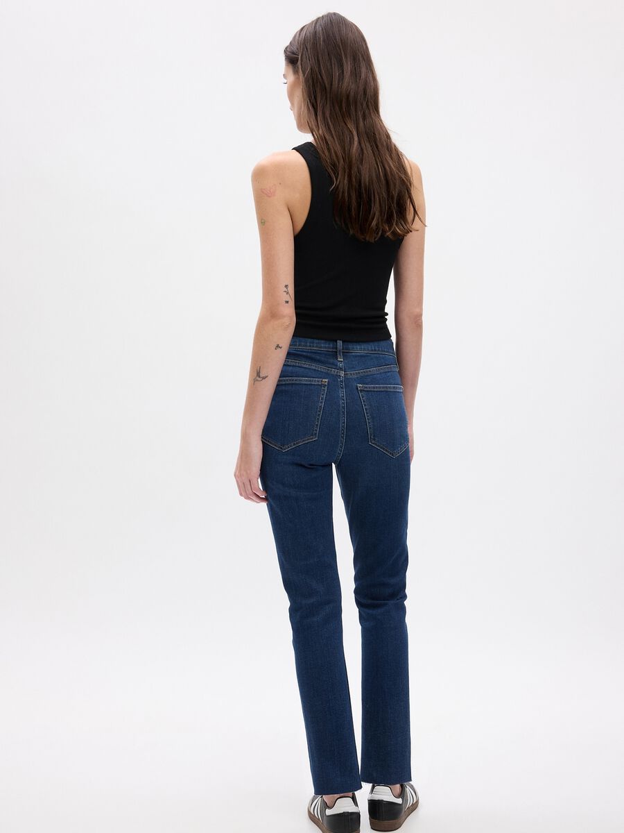 Jeans slim fit a vita alta con orlo a vivo Donna_1