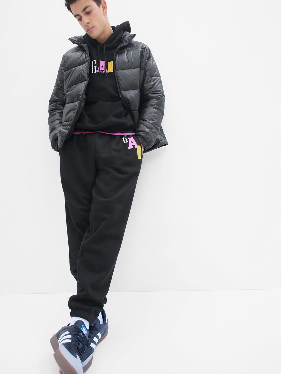 Plush joggers with multicoloured logo print Man_0