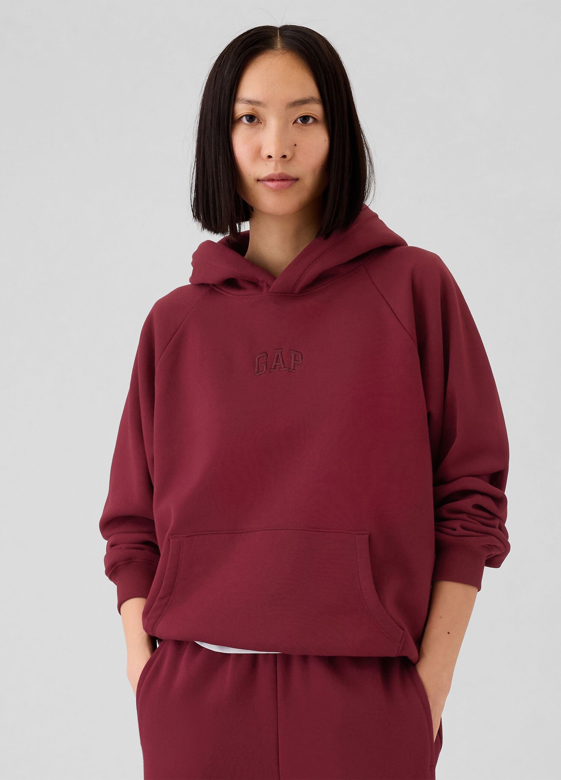 Felpa con cappuccio maniche raglan
