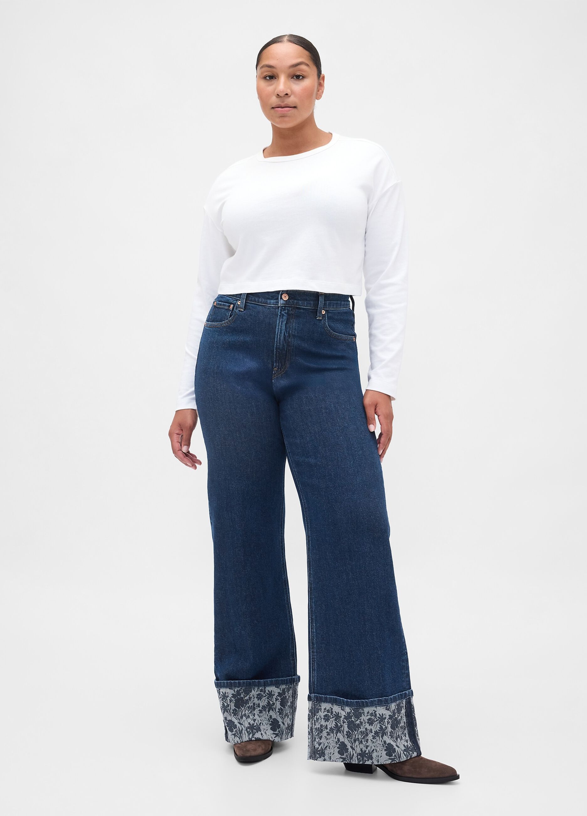 Wide denim trousers with floral turn-up