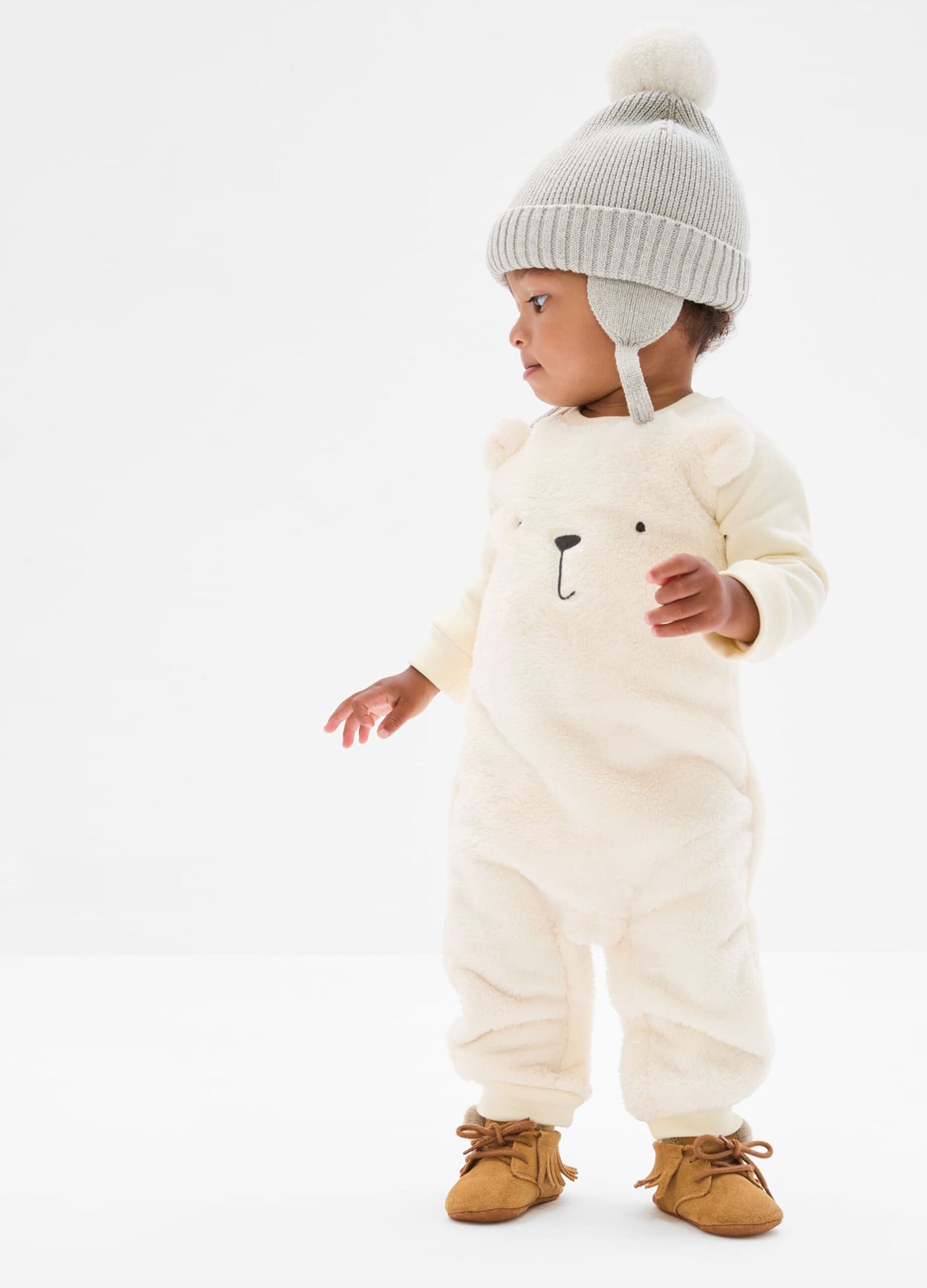 Faux fur onesie with embroidered teddy