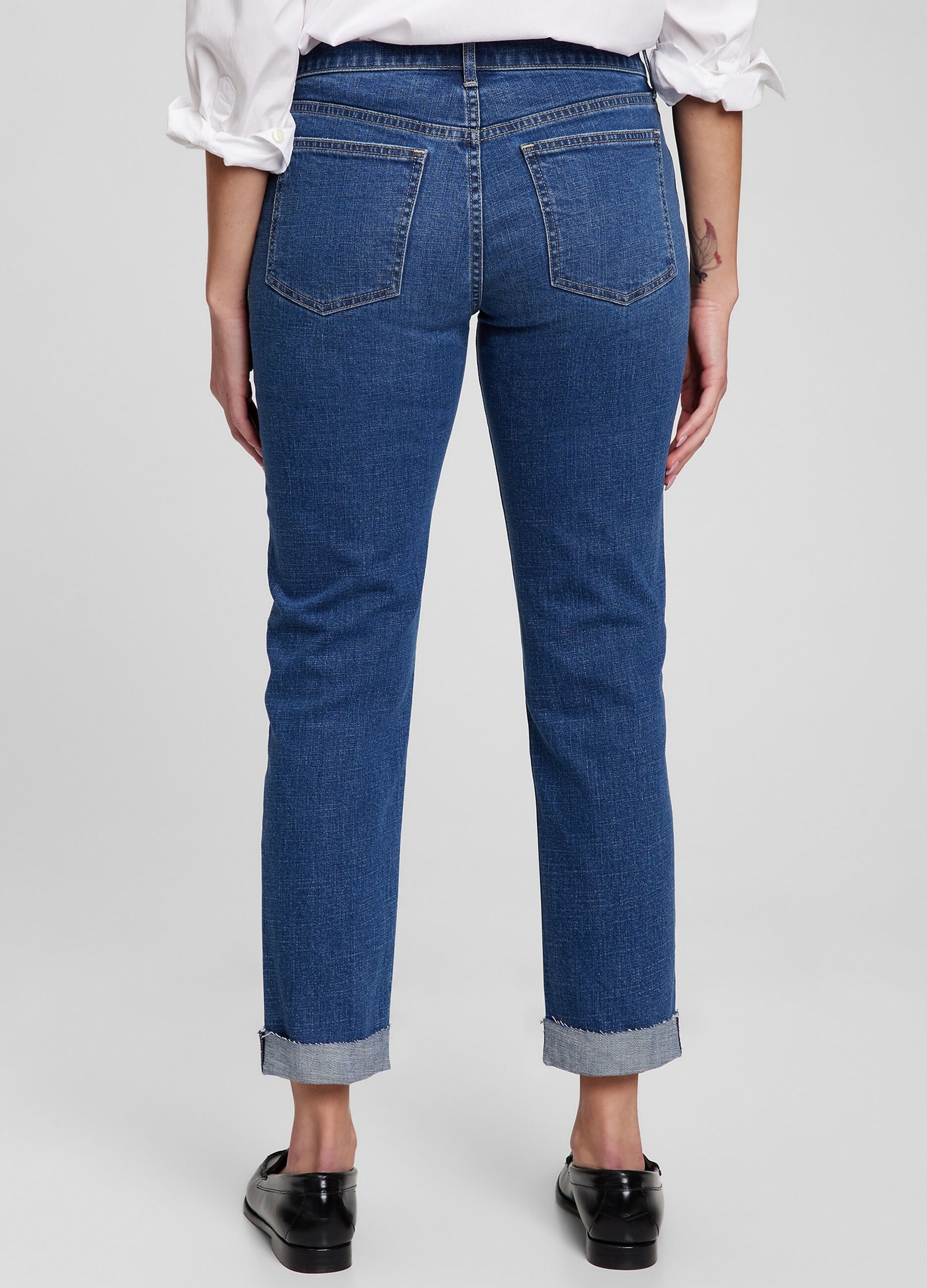Girlfriend jeans with abrasions and raw edged hem_1