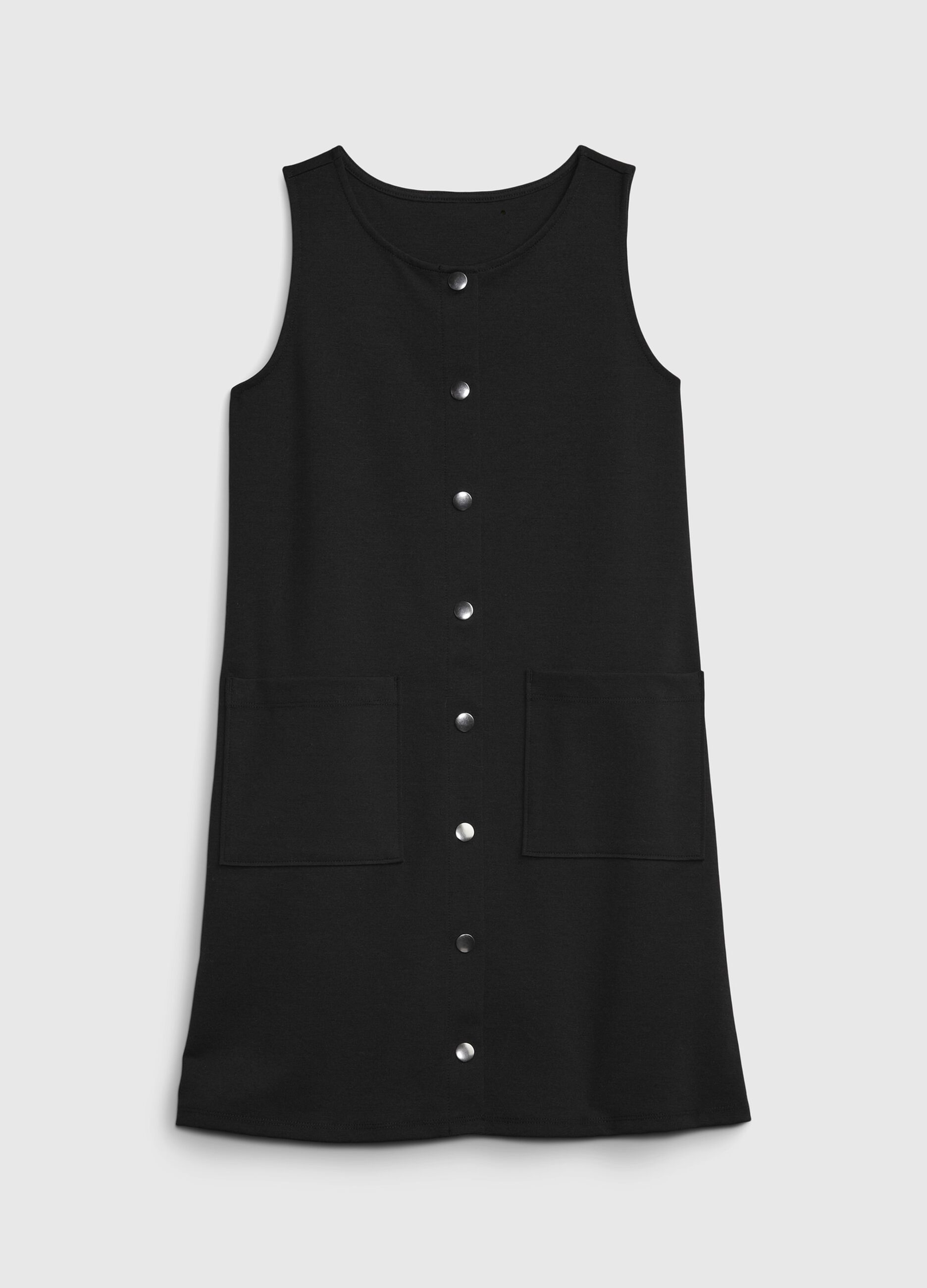 Sleeveless dress with snap fasteners