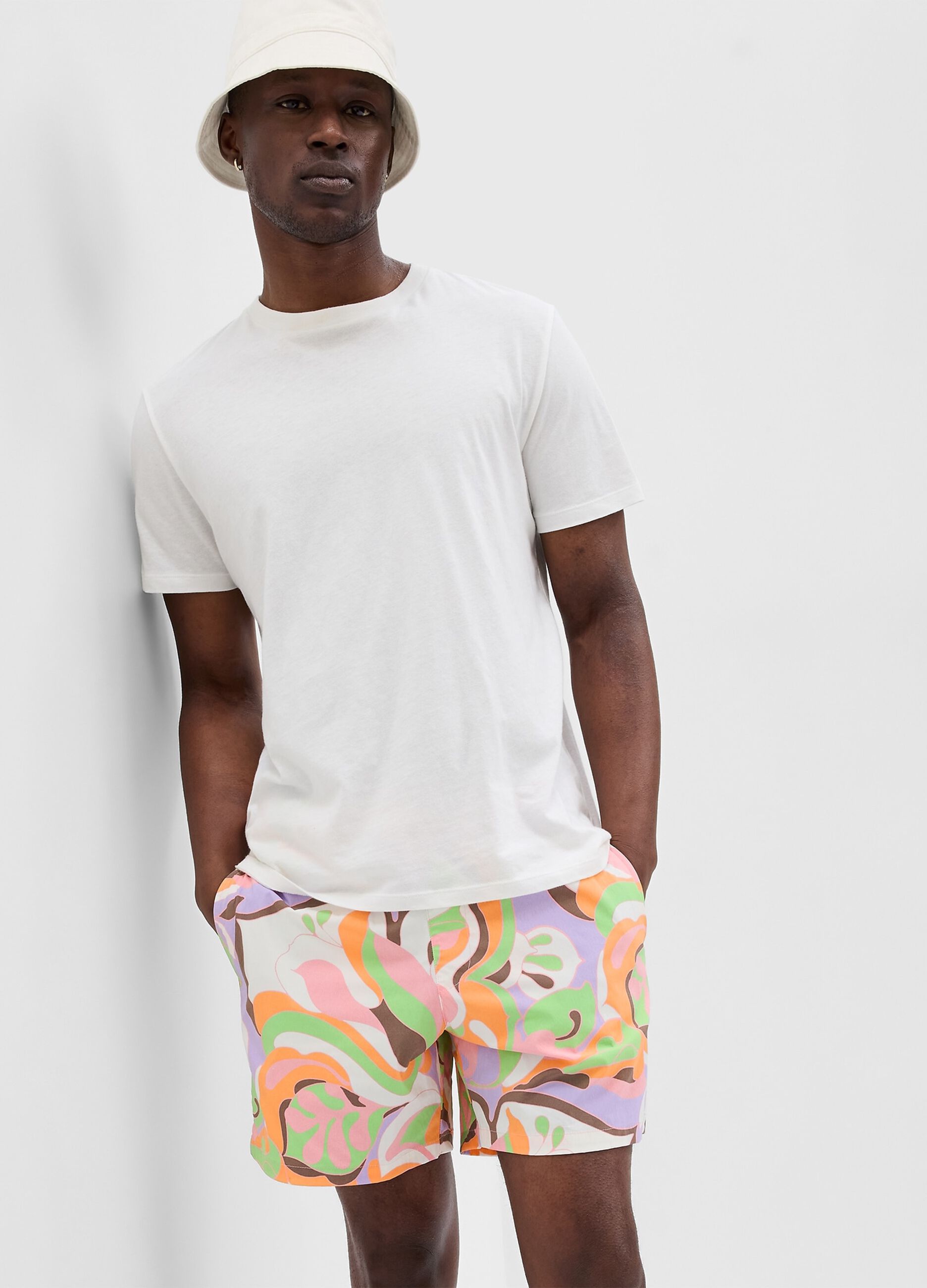 Swimming trunks with foliage print