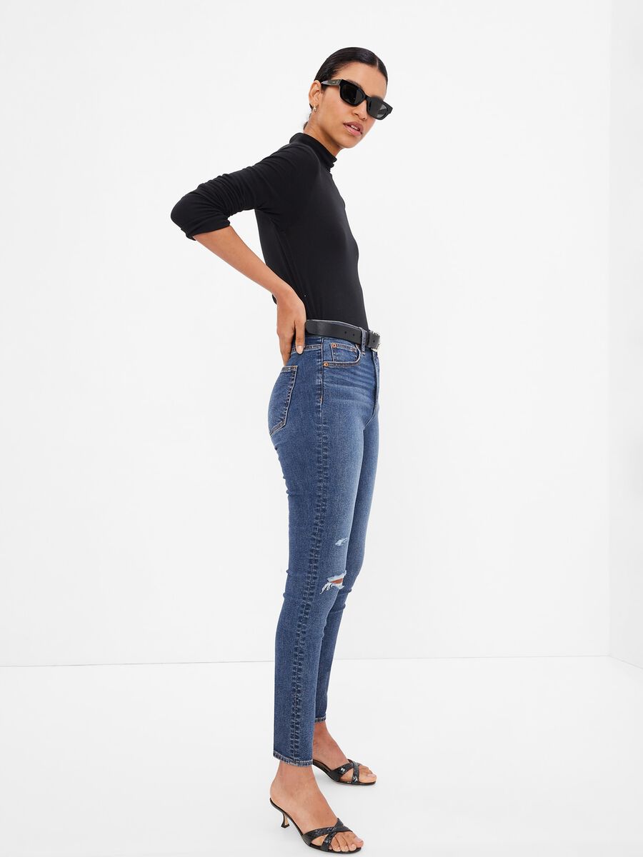 High-waisted skinny-fit jeans with worn look Woman_0