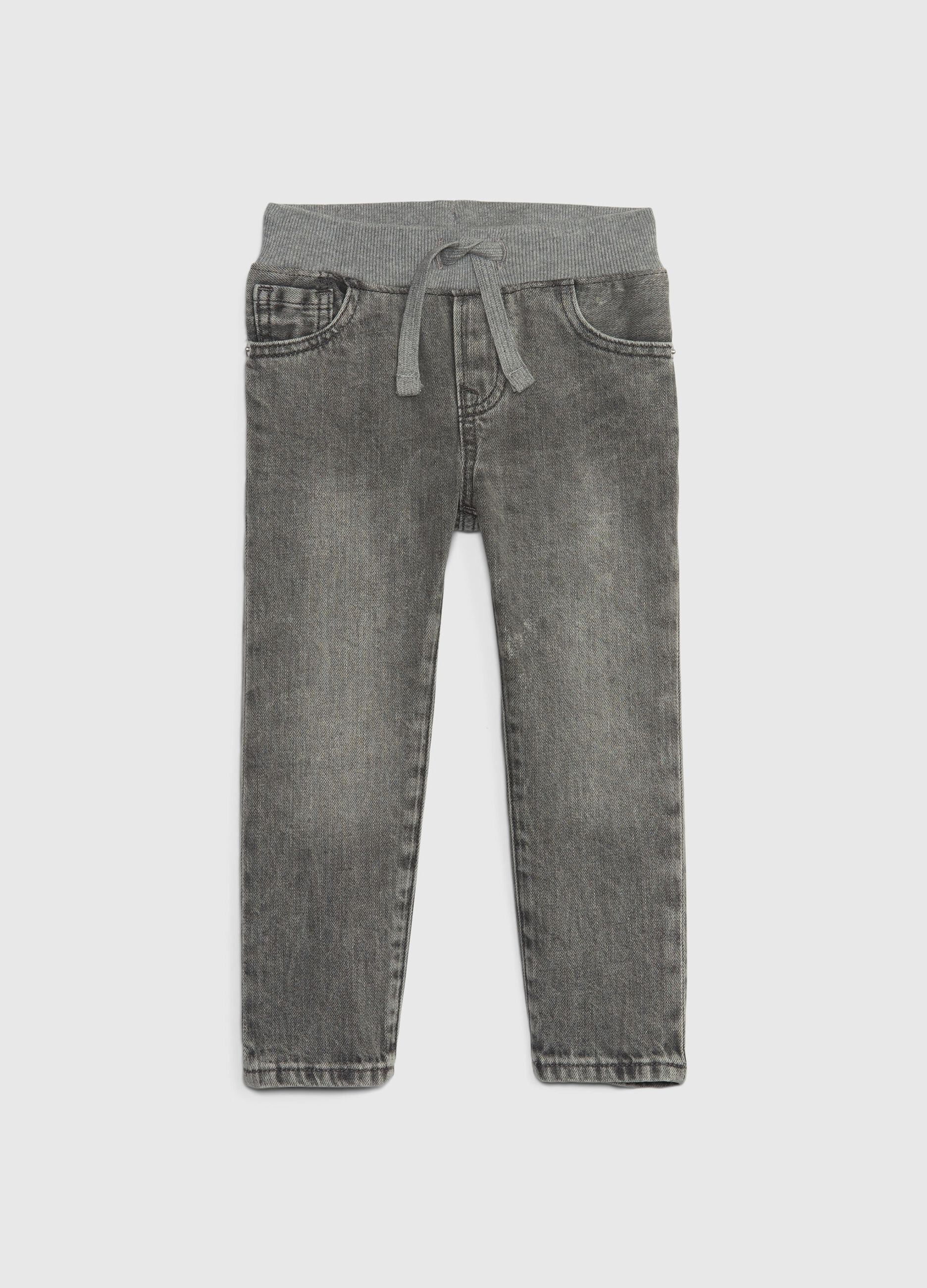 Slim-fit trousers in denim with drawstring