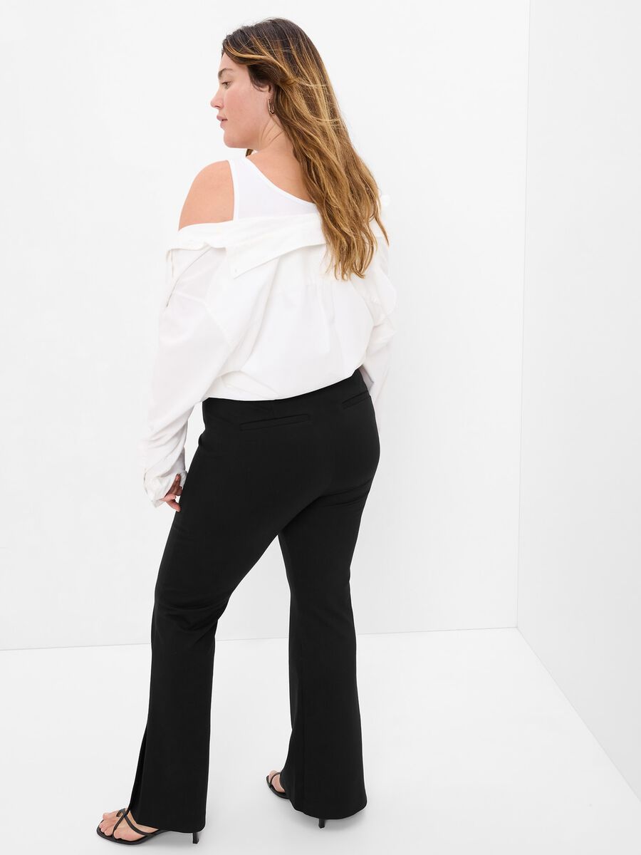 Pantaloni flare fit con spacchi Donna_3