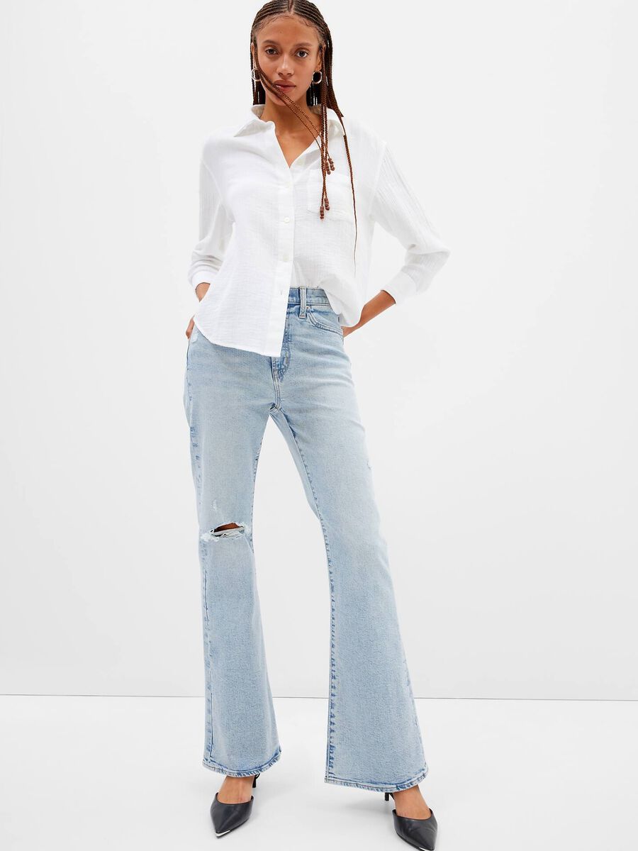 Flare-fit jeans with worn look Woman_0