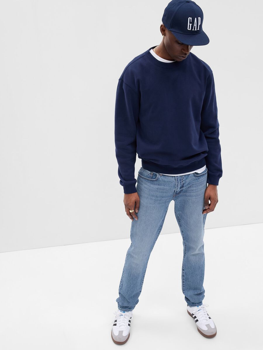 Jeans slim fit vita media con scoloriture Uomo_0