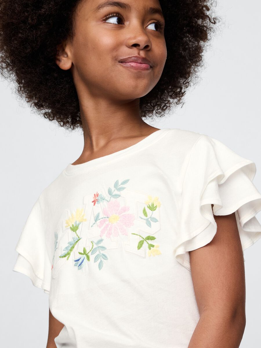 T-shirt a maniche corte bianca con volant e stampa floreale Bambina_2