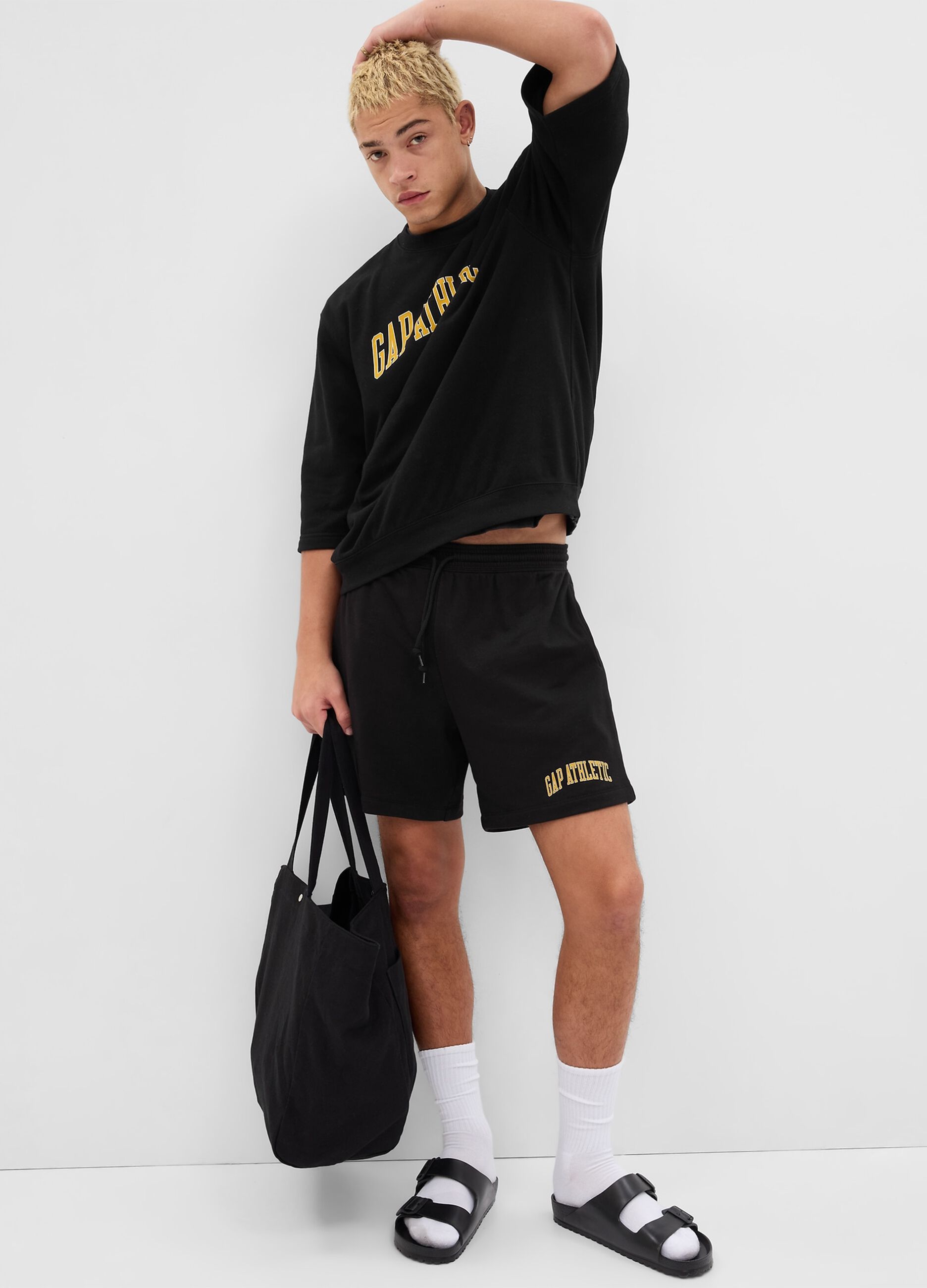Fleece shorts with Athletics logo print