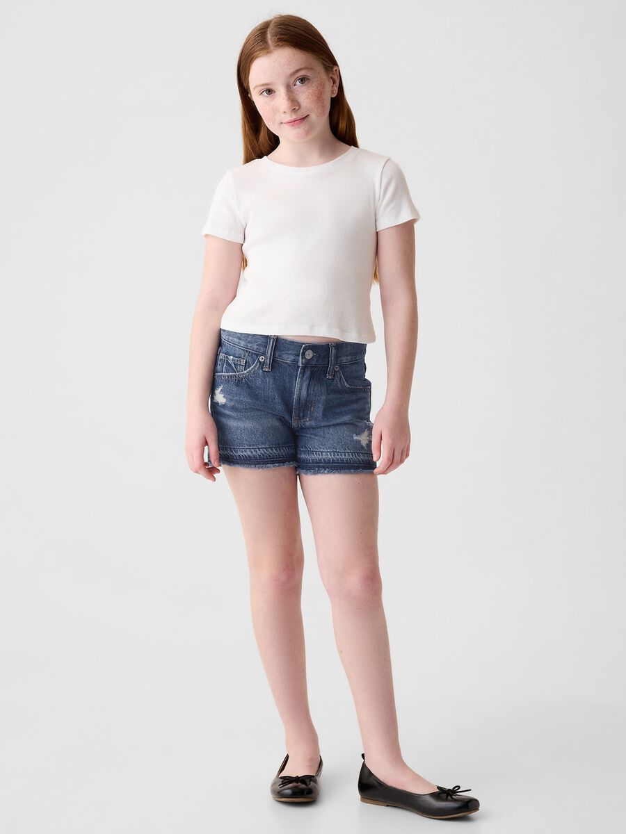 Shorts in denim con abrasioni a vita bassa Bambina_0