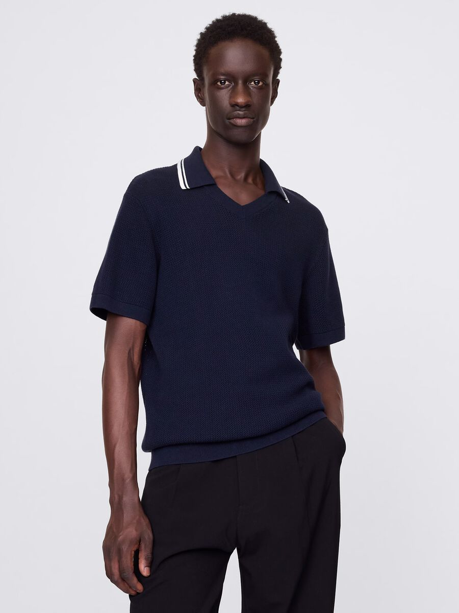 Polo traforata in cotone blu Uomo_0