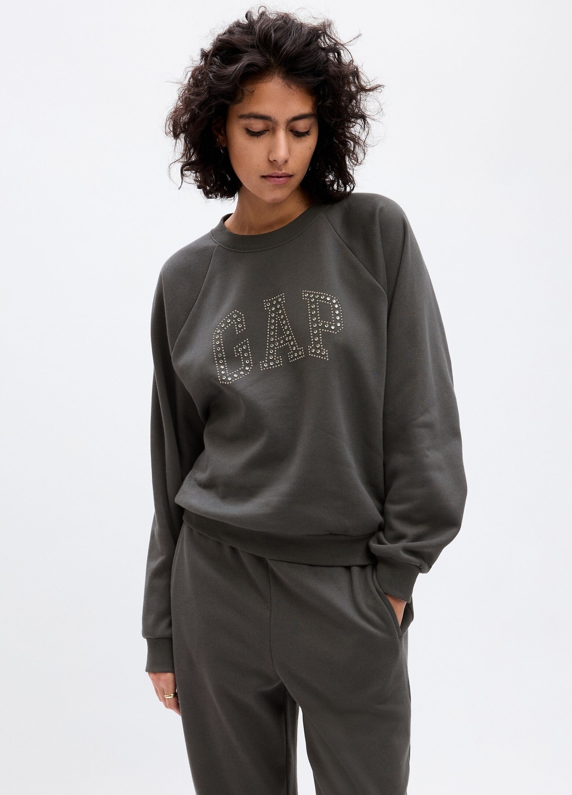 Sweatshirt with studs and sequins logo