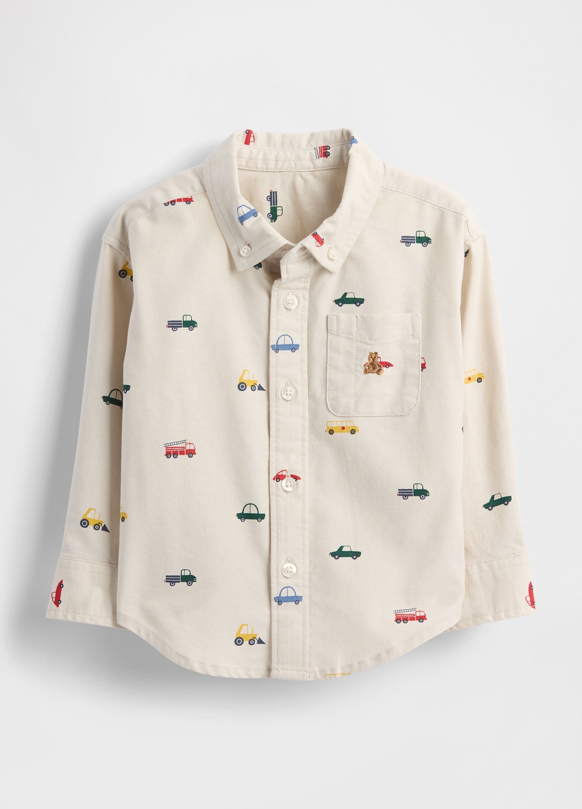 Long-sleeved beige shirt with car patterns