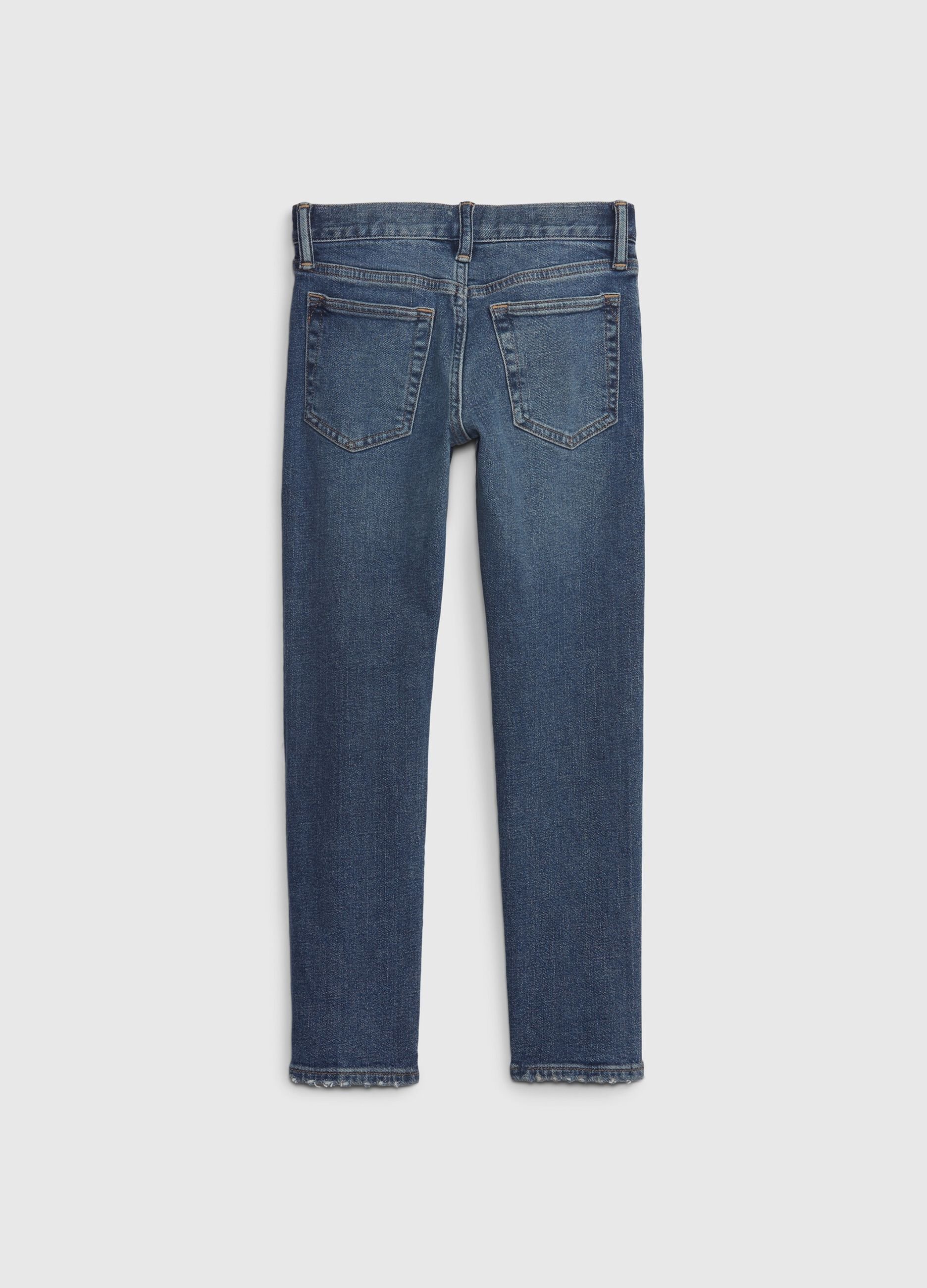 Slim-fit jeans with rips and fading_1