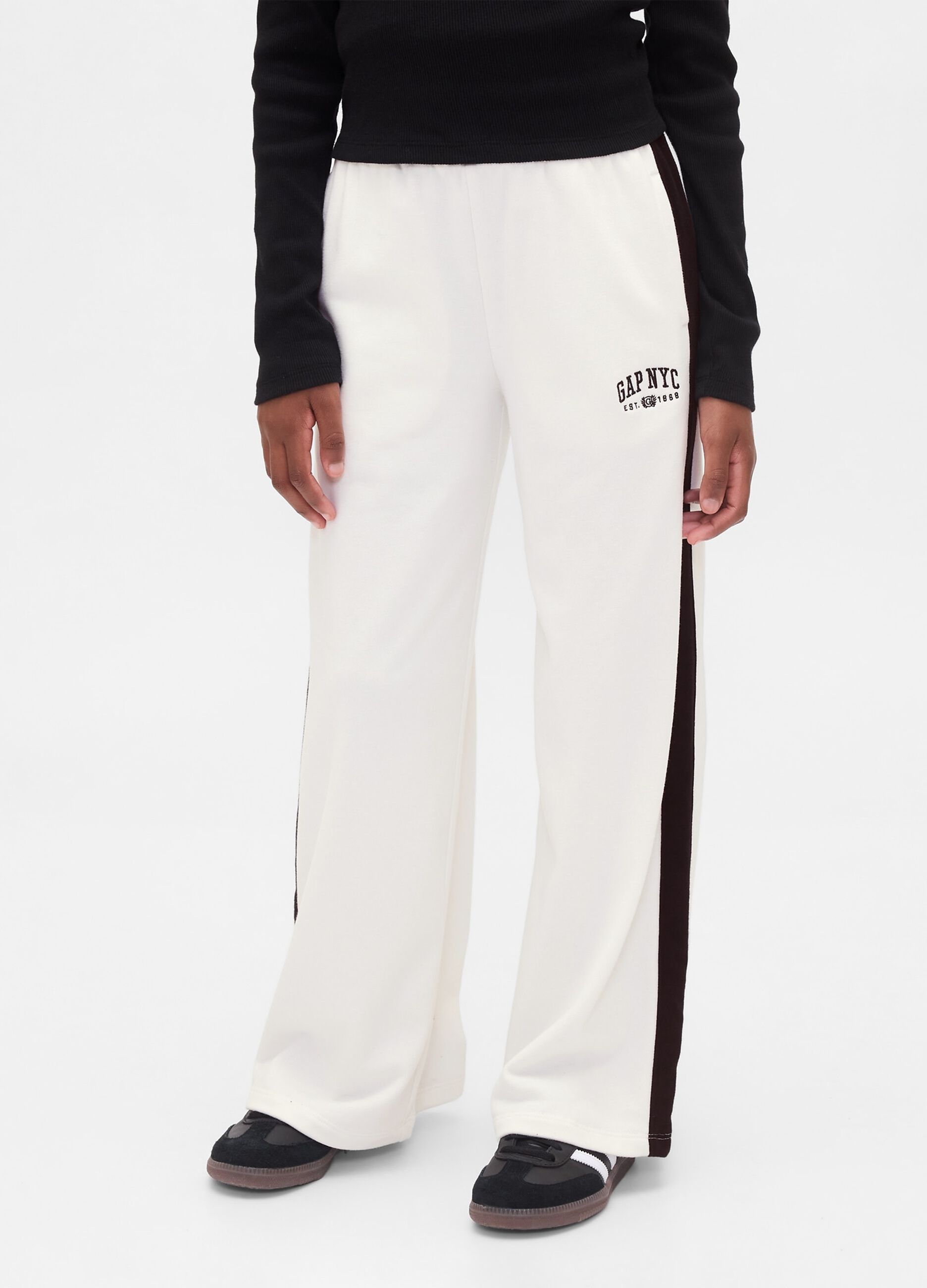Pantaloni bianchi per bambina in cotone_1