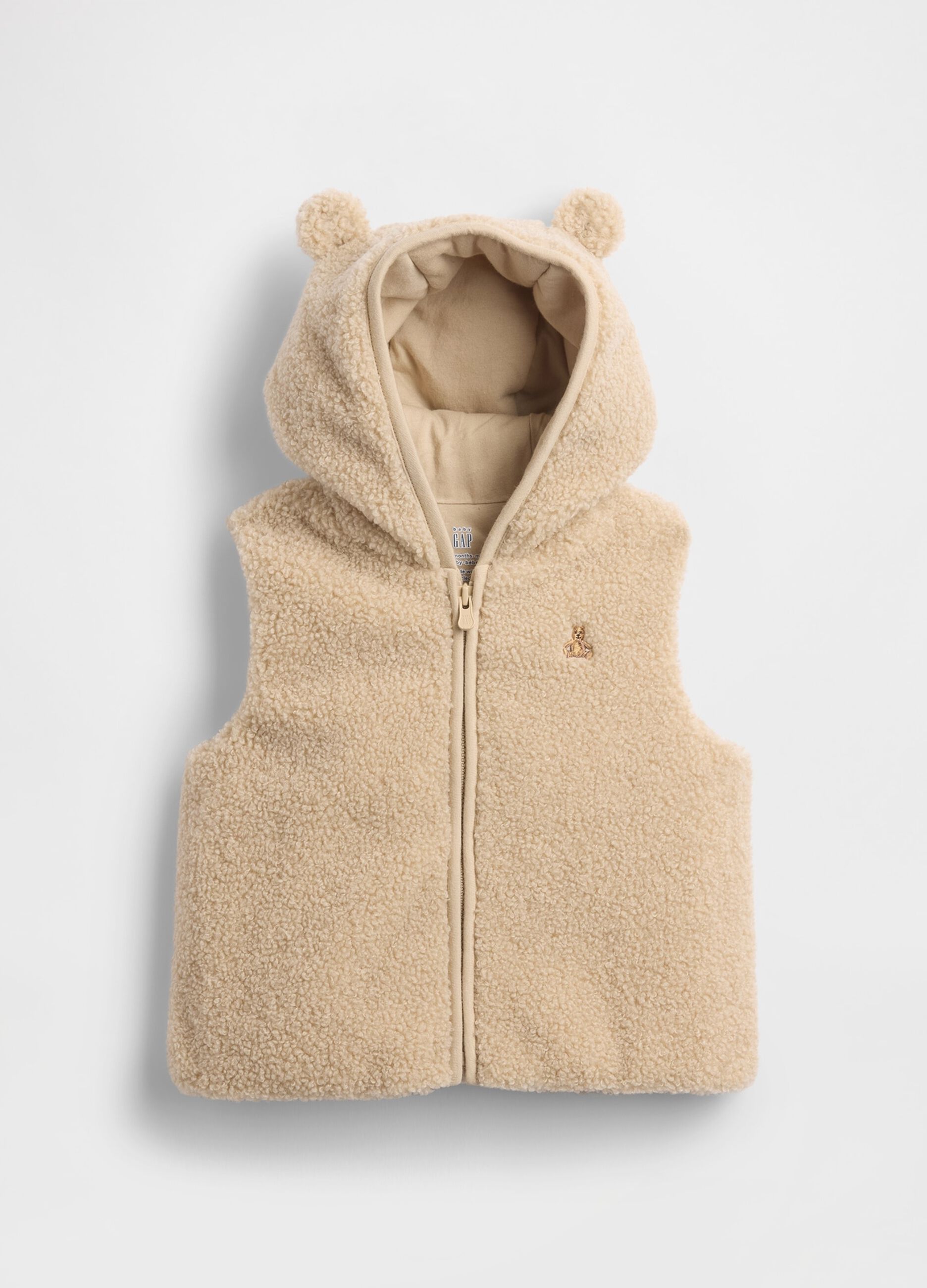 Gilet beige in tessuto sherpa con cappuccio