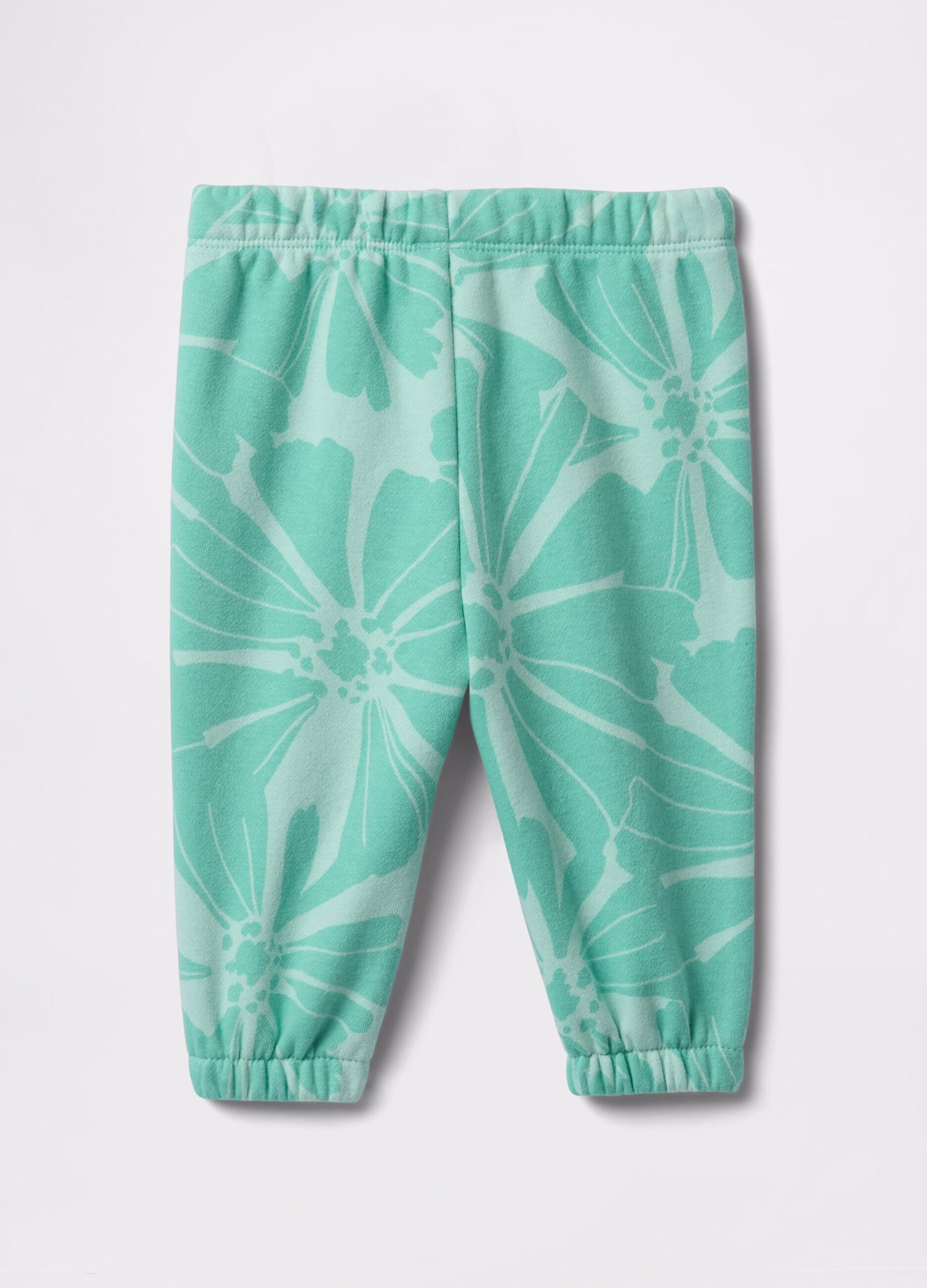 Joggers azzurri con coulisse stampa fiori e ricamo logo_1