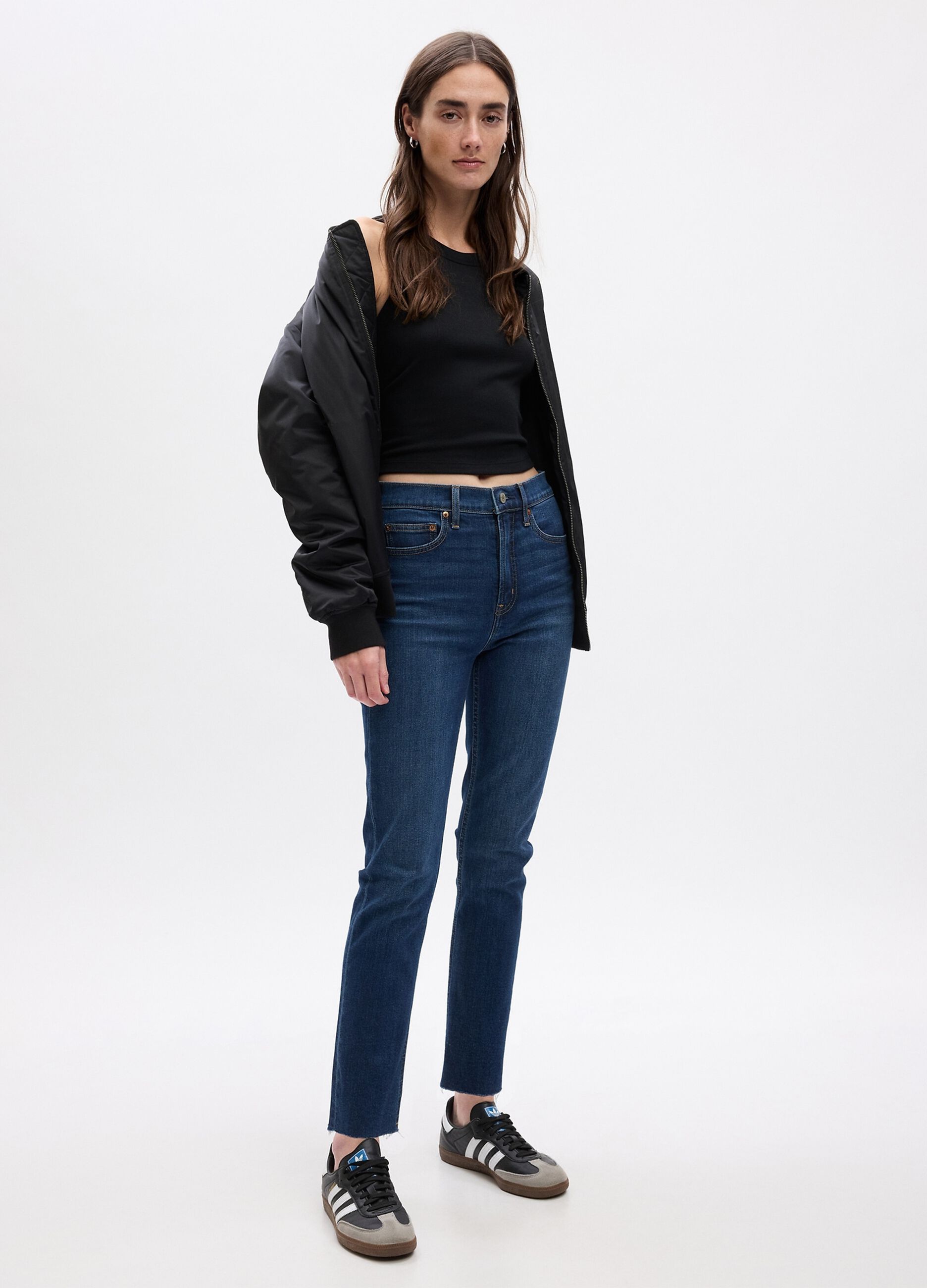 Jeans slim fit a vita alta con orlo a vivo