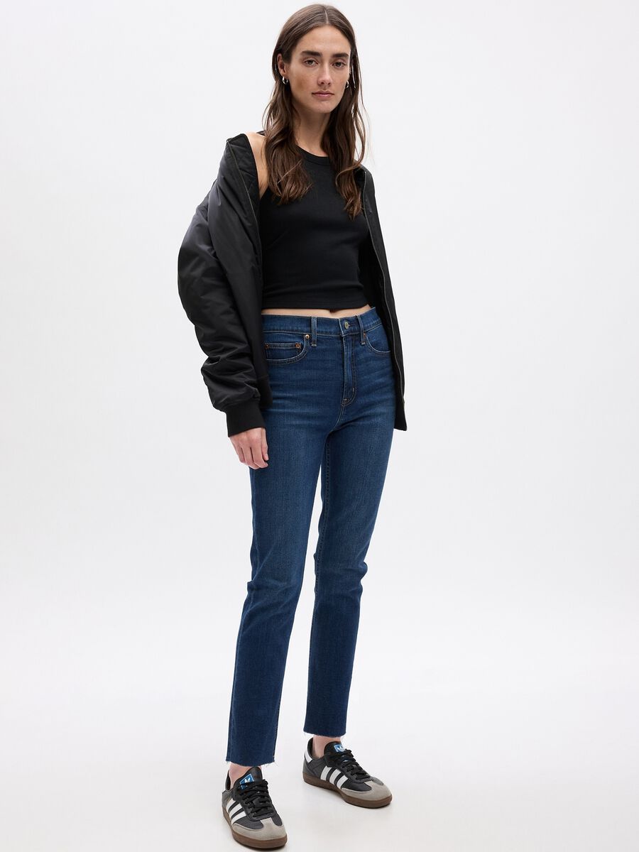 Jeans slim fit a vita alta con orlo a vivo Donna_0