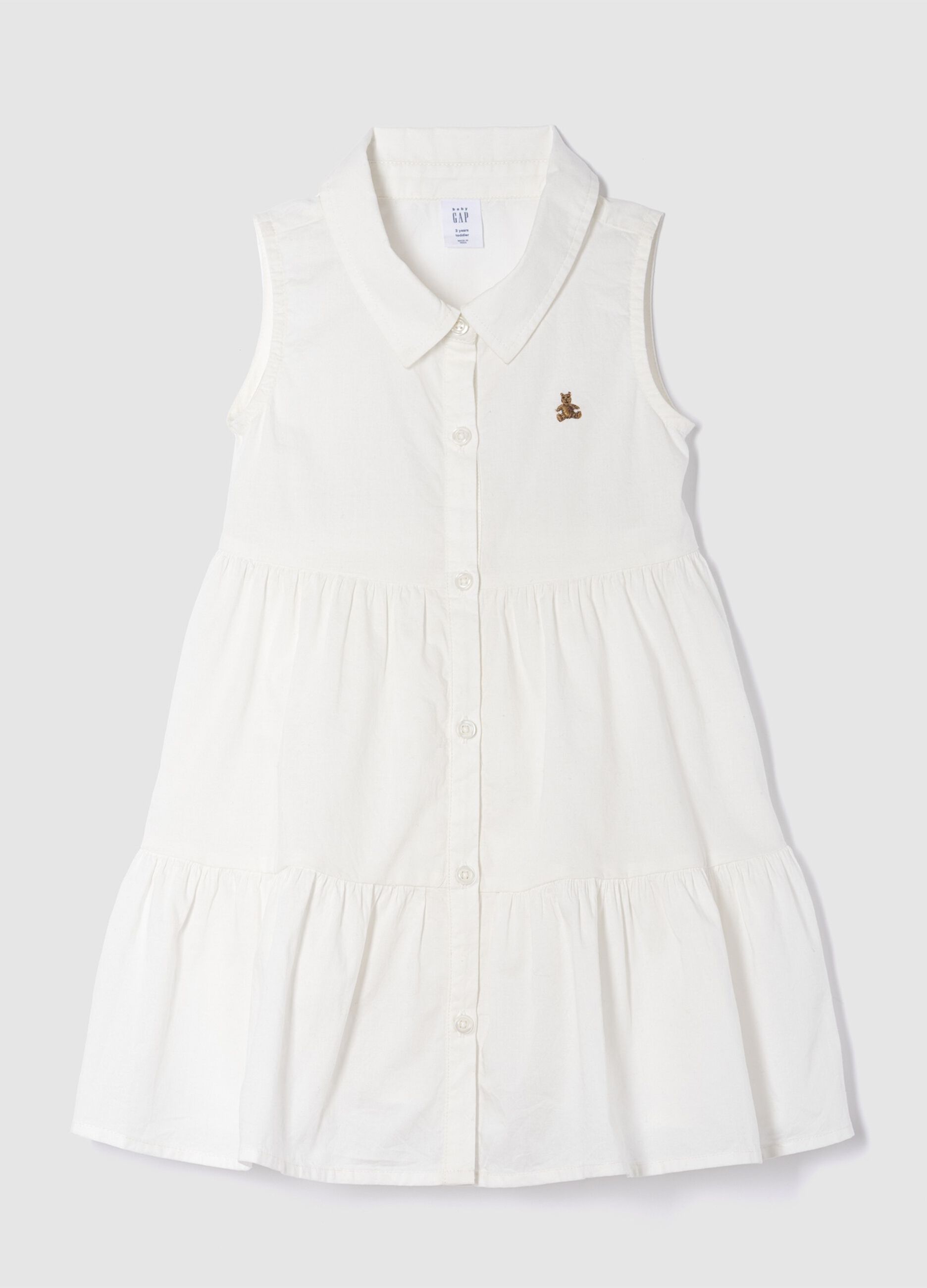 Abito bianco in cotone a balze